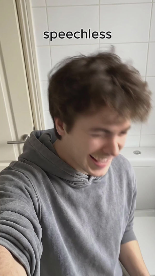 Young college age buck in his selfie reaction video after trying his first rinse Hey-Hey moment with his new Hey Hey Bidet